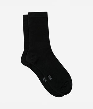 Chaussettes unies noires en laine douce Femme