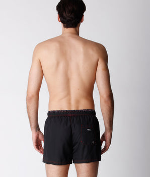 Black swimming costume in quick-drying technical fabric