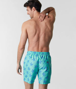 Aquamarinblaue Badeshorts mit Seestern-Print