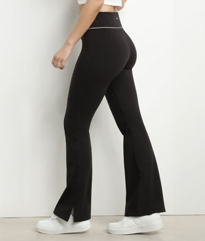 Pantalón deportivo acampanado de mujer en punto elástico negro Dim Move