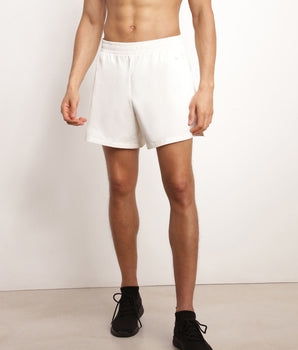 Short de sport homme en matière aérée Écru Dim Move