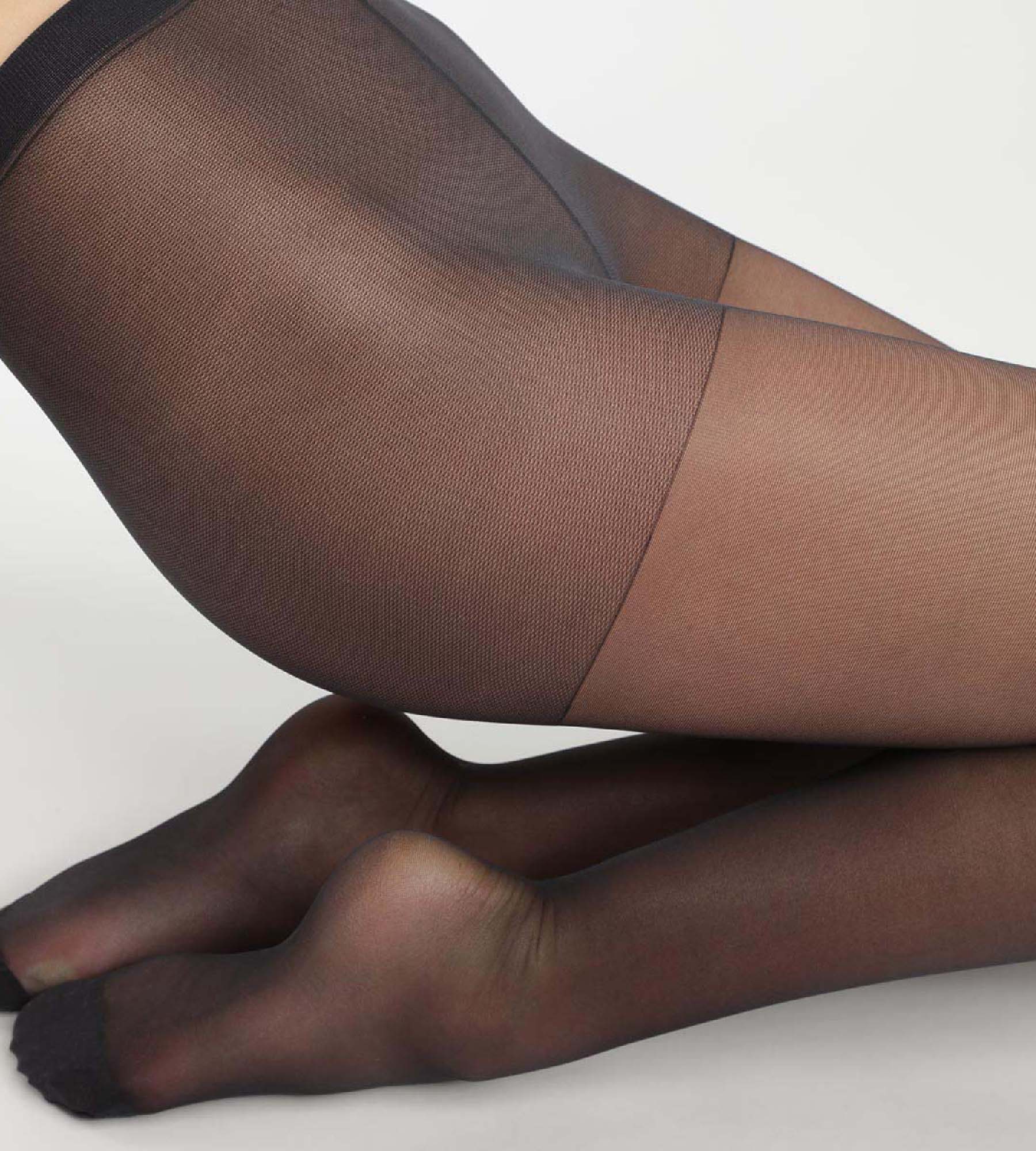 Women's Black Ultra Resist sheer tights made of reinforced Lycra